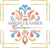 Logo of Arroyo & Amber Boutique with decorative elements on a white background