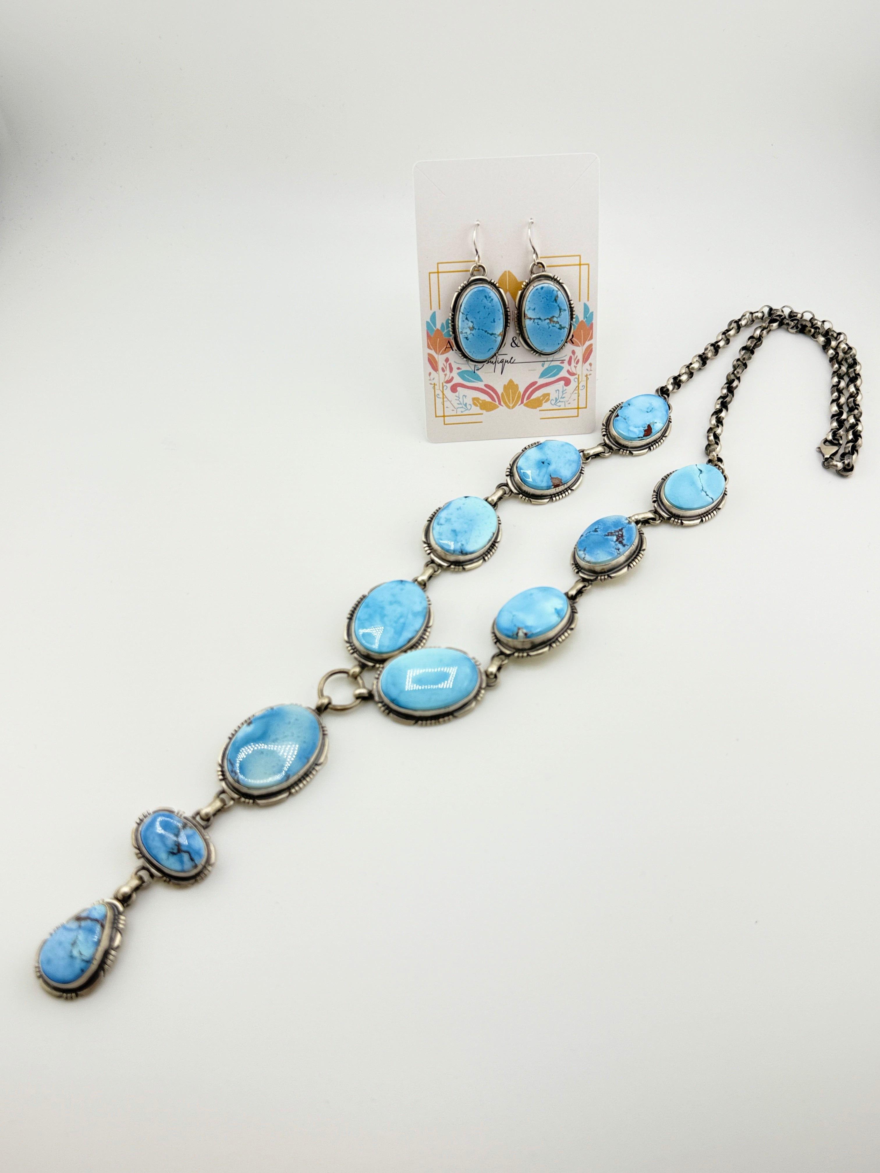Necklace with blue stones on a white background