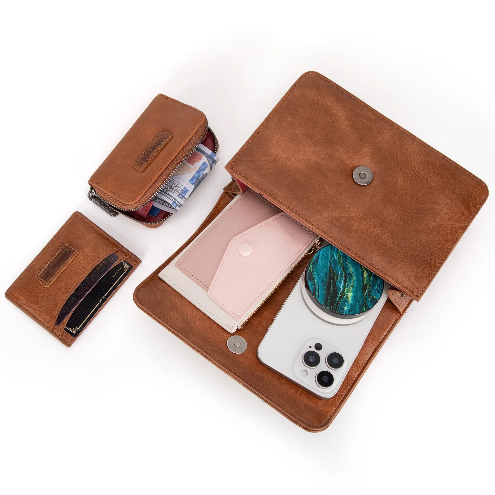 A brown Wrangler 3-piece crossbody bag set including a quilted flap crossbody bag, a matching coin wallet, and a compact card case, all detailed with the iconic Wrangler logo.