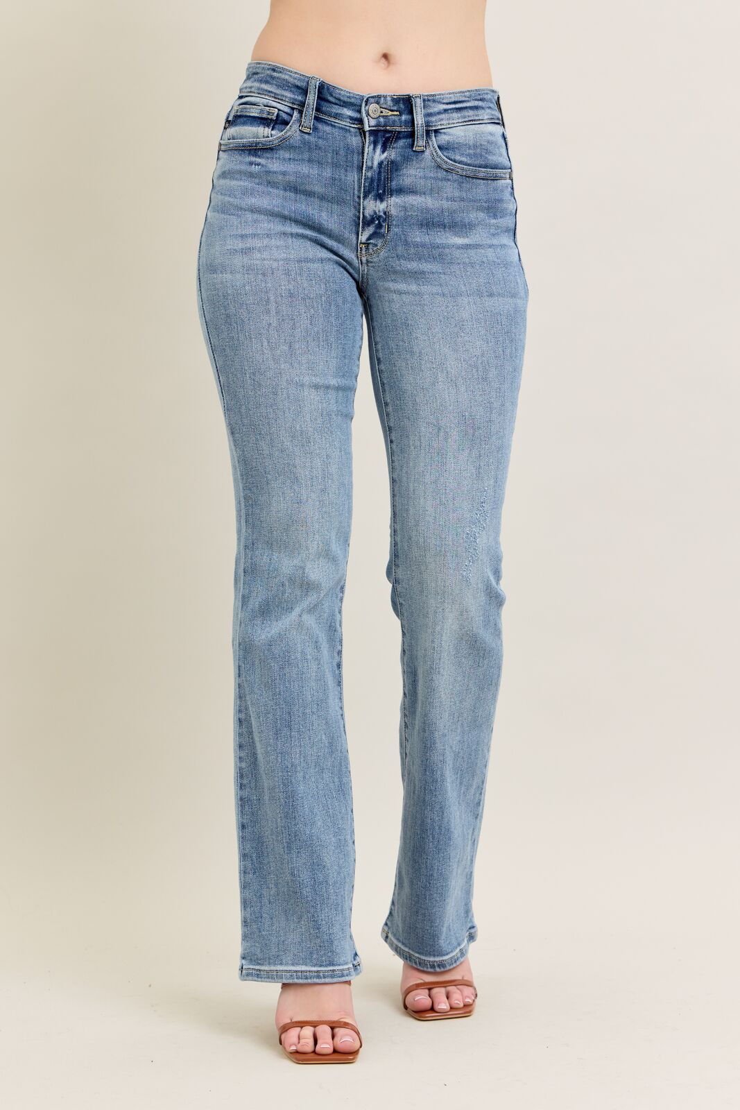 Blue jeans on a beige background