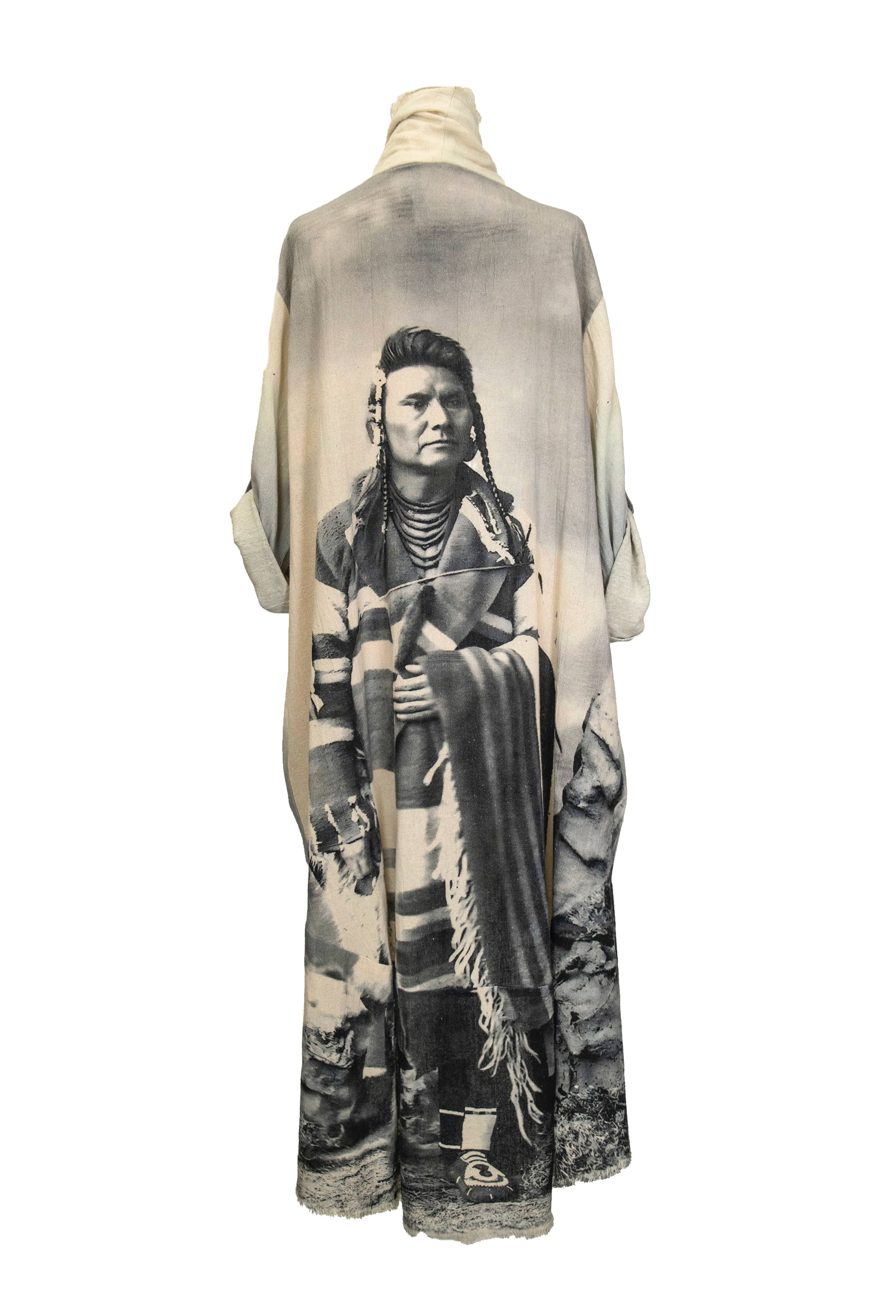 Long scarf with a Native American design on a white background