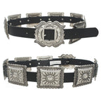 Black belt with silver concho-style buckles on a white background