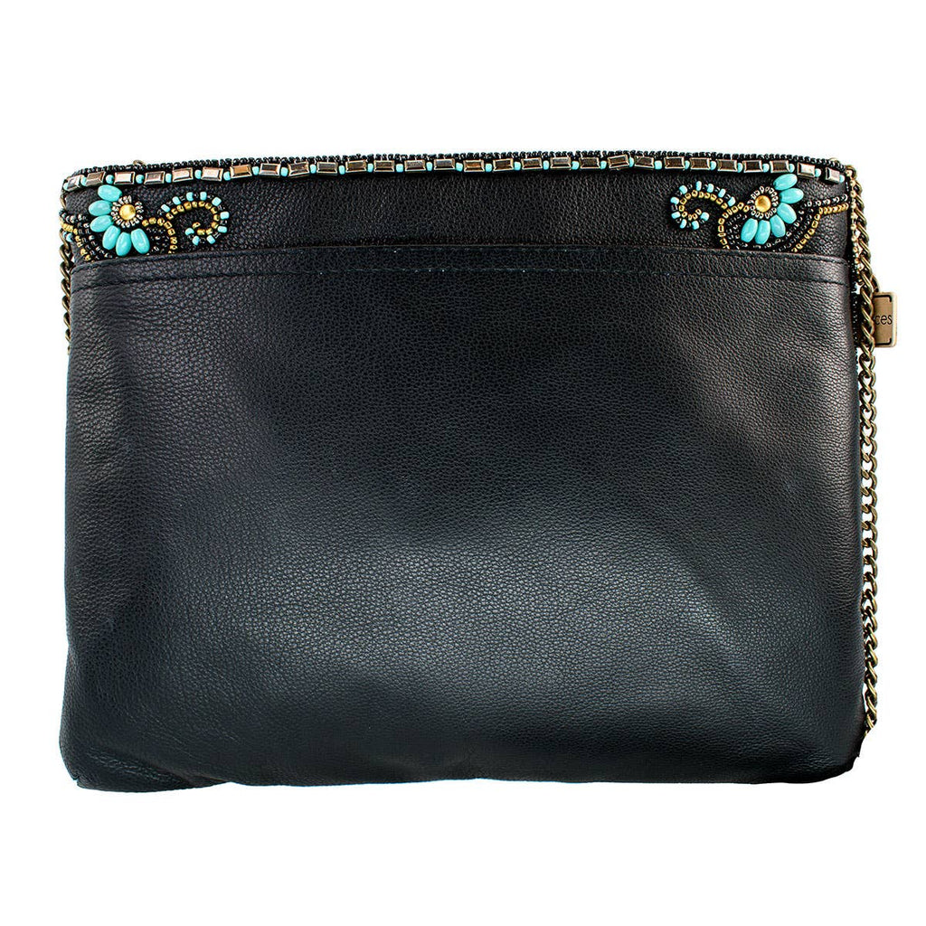 Black leather clutch with decorative embellishments on a white background