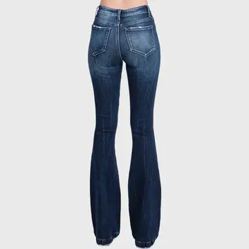 Blue flared jeans on a white background