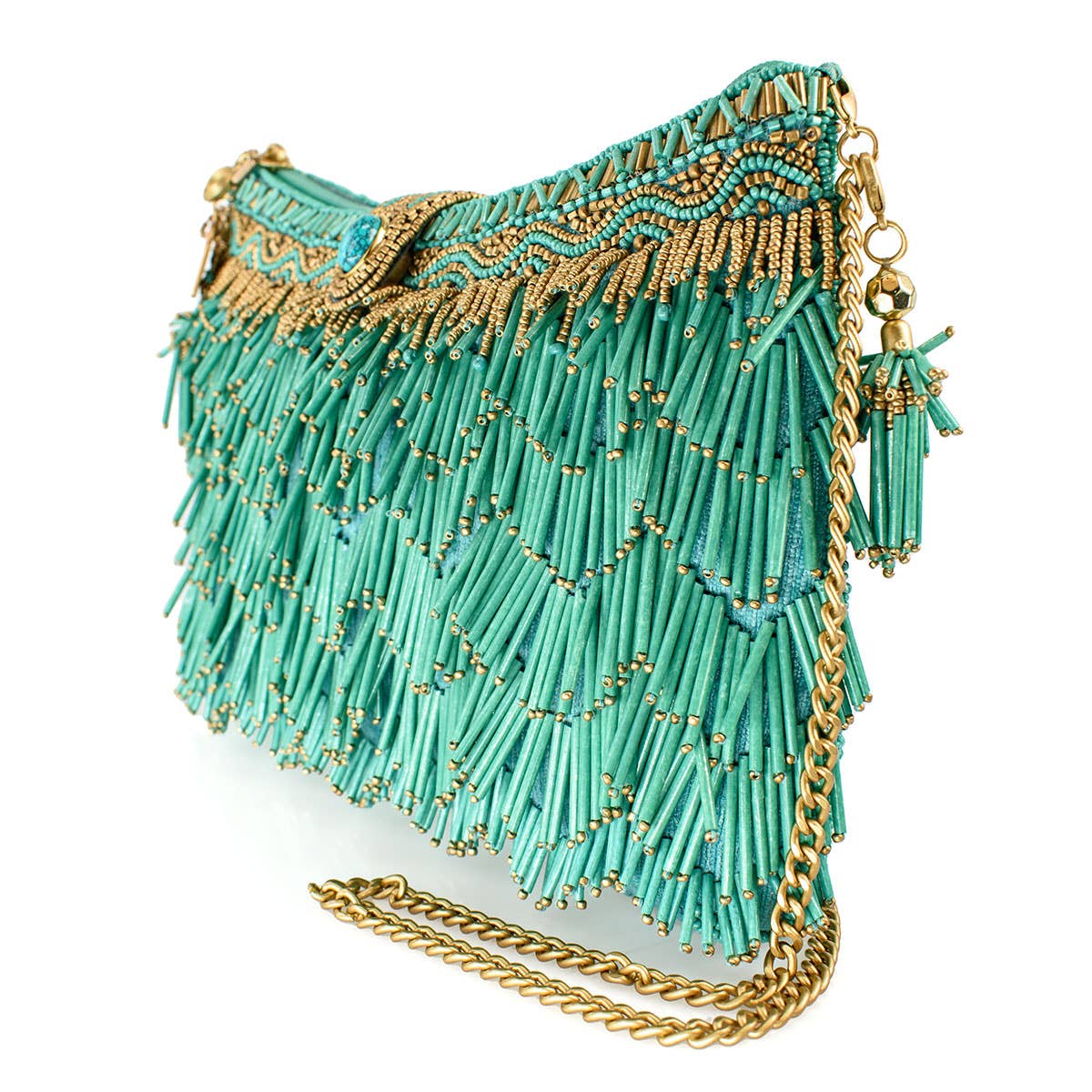 Turquoise handbag with gold fringe and chain detail on a white background