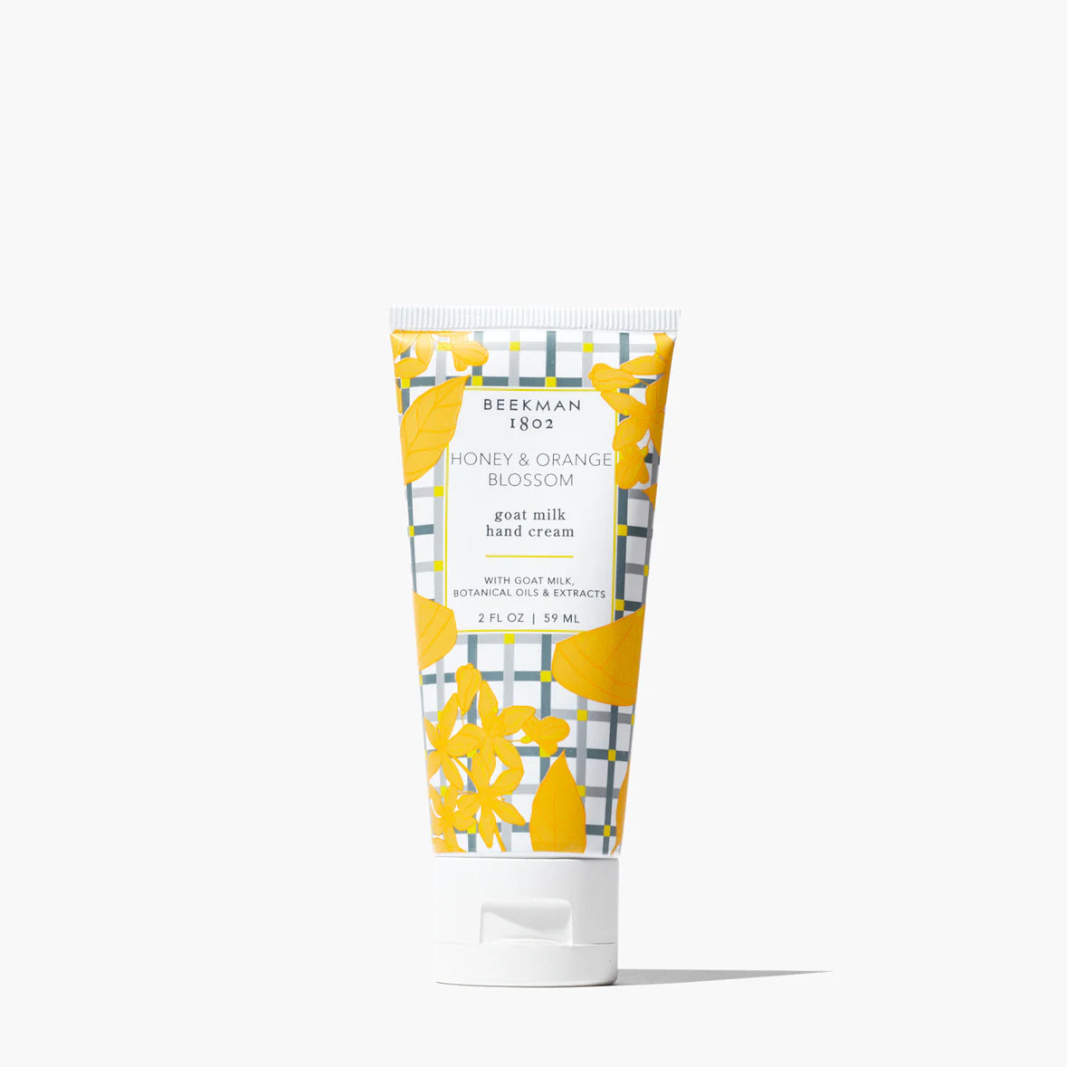 Beekman 1802 goat milk hand cream with honey and orange blossom scent on a white background