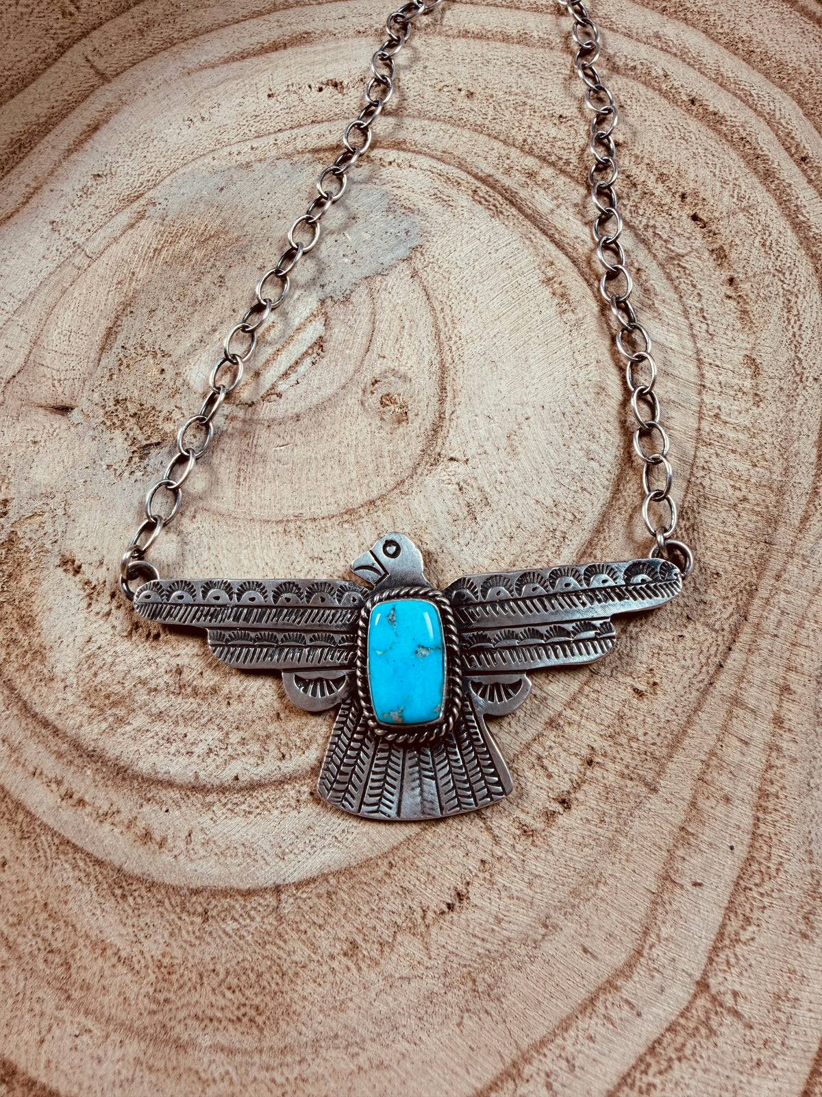 Kingman Turquoise Thunderbird Necklace by Russell Sam