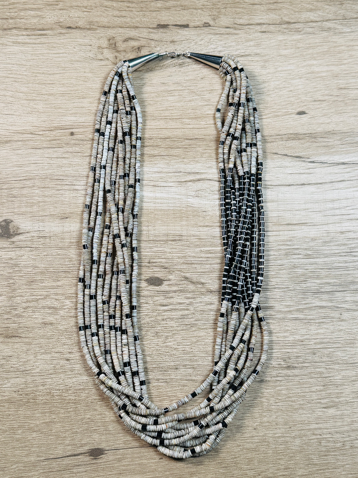 10 Strand Brown and Black Heishi Bead Necklace by W. Calabaza