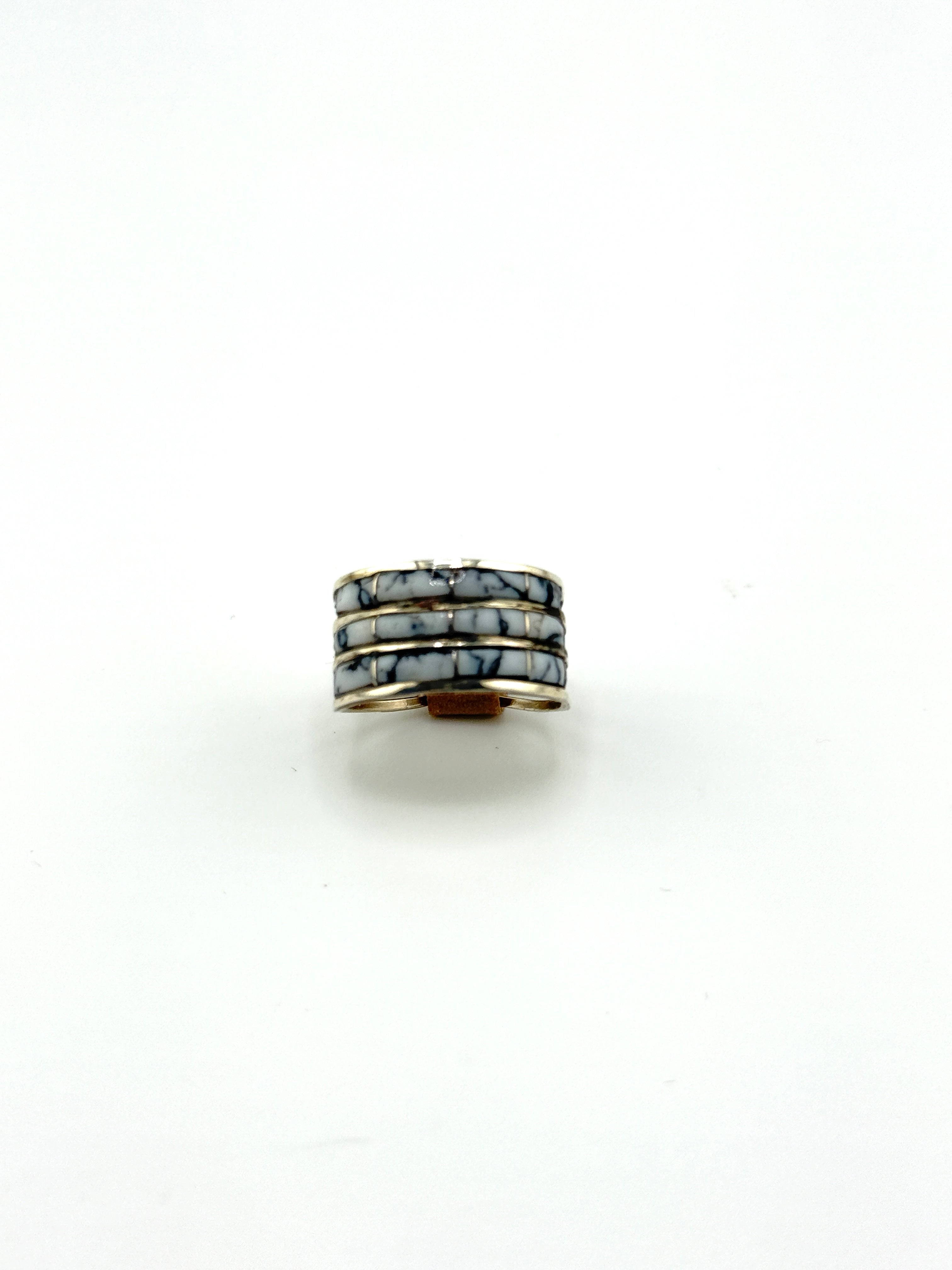 Ring with multiple bands on a white background