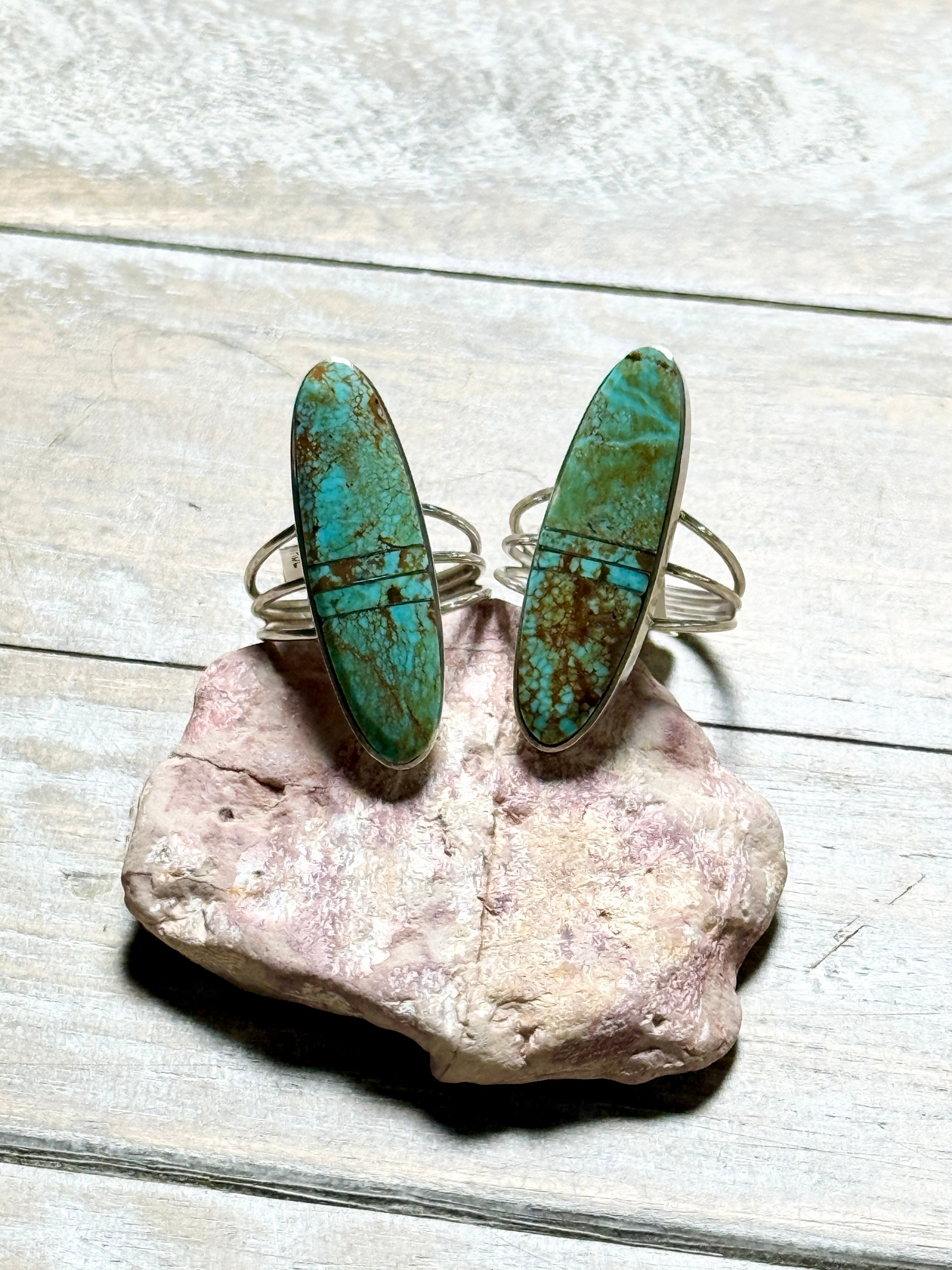 Turquoise rings with silver inlay by Harold Smith