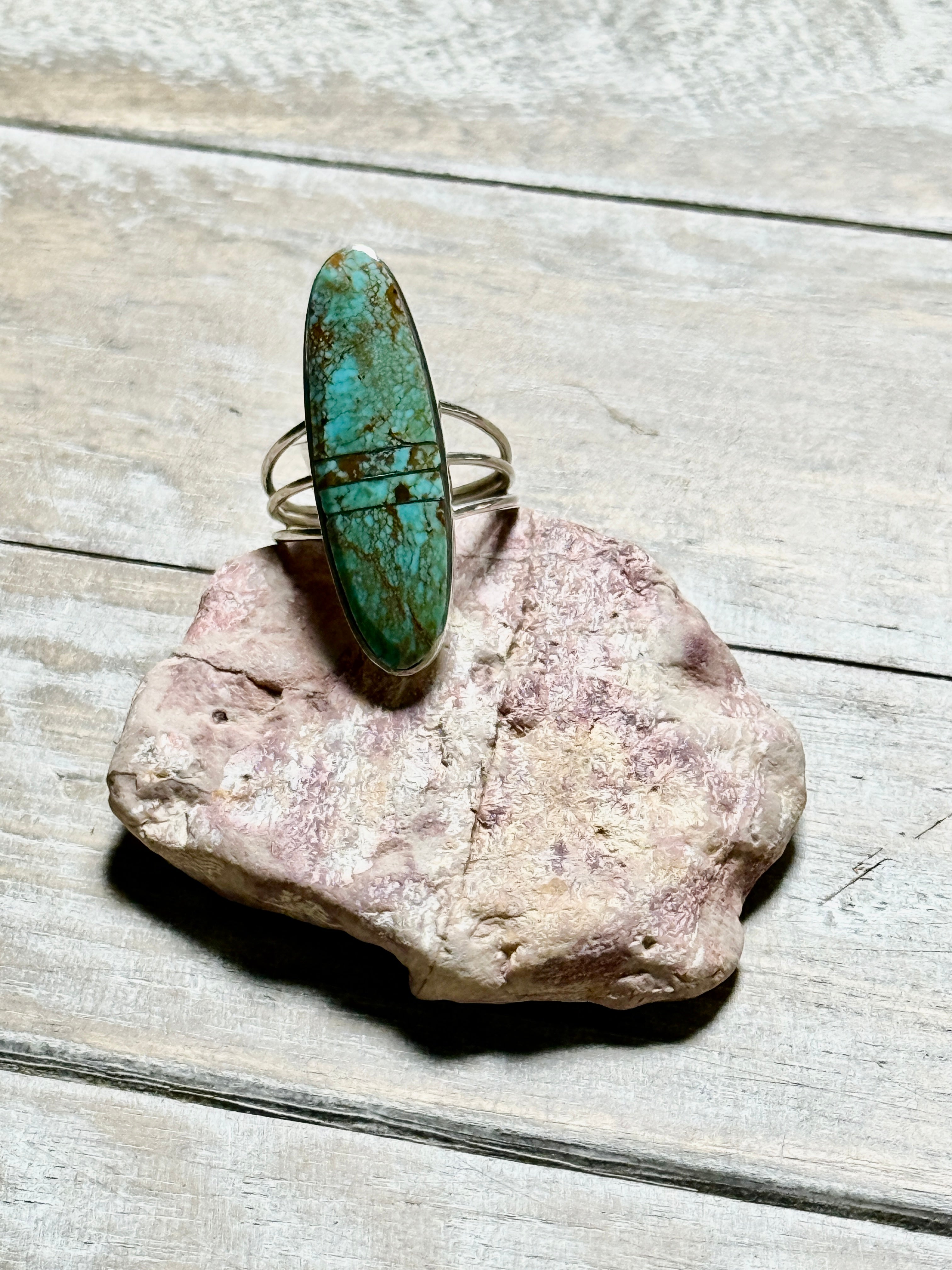 Turquoise rings with silver inlay by Harold Smith