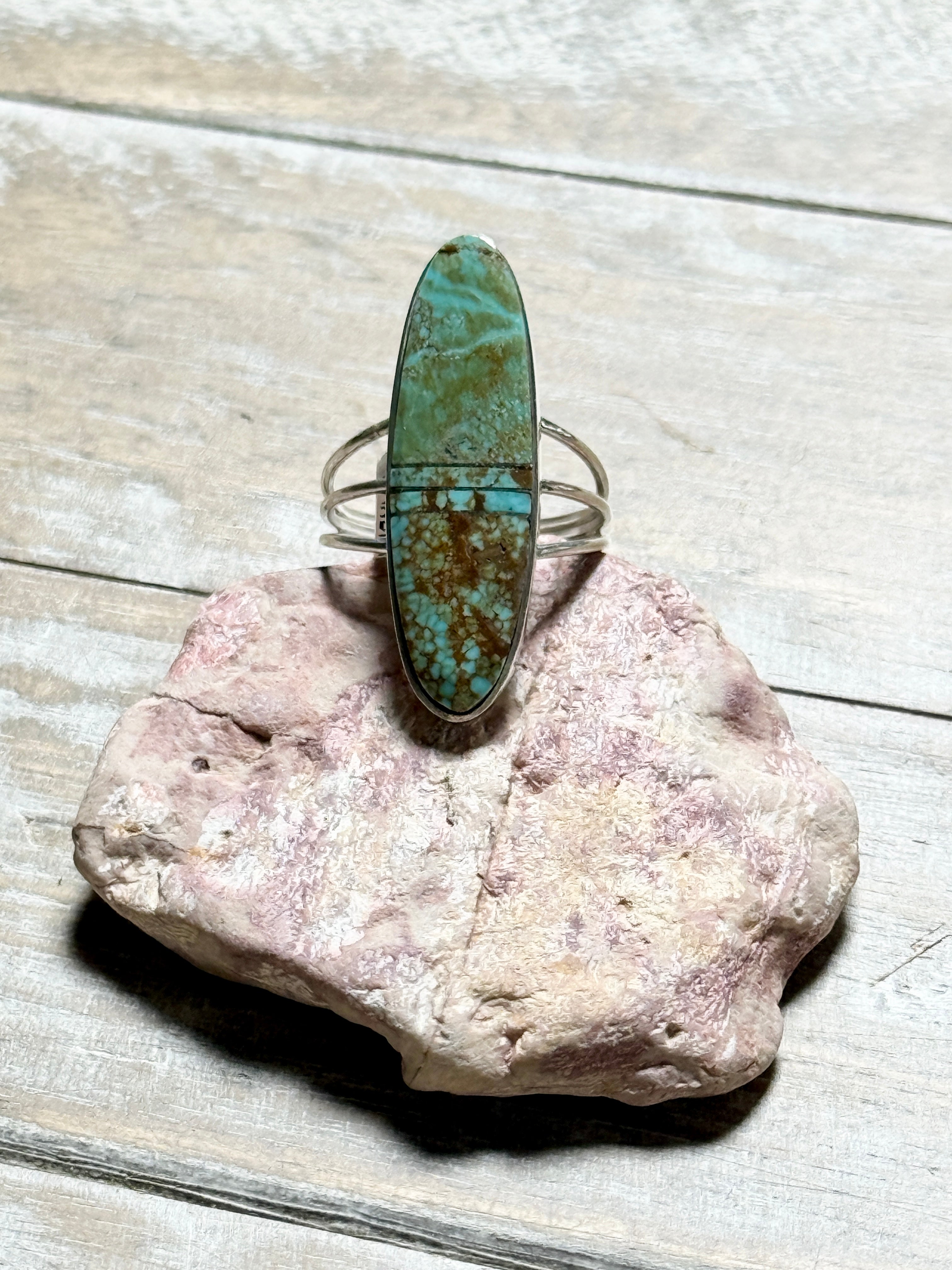 Turquoise rings with silver inlay by Harold Smith