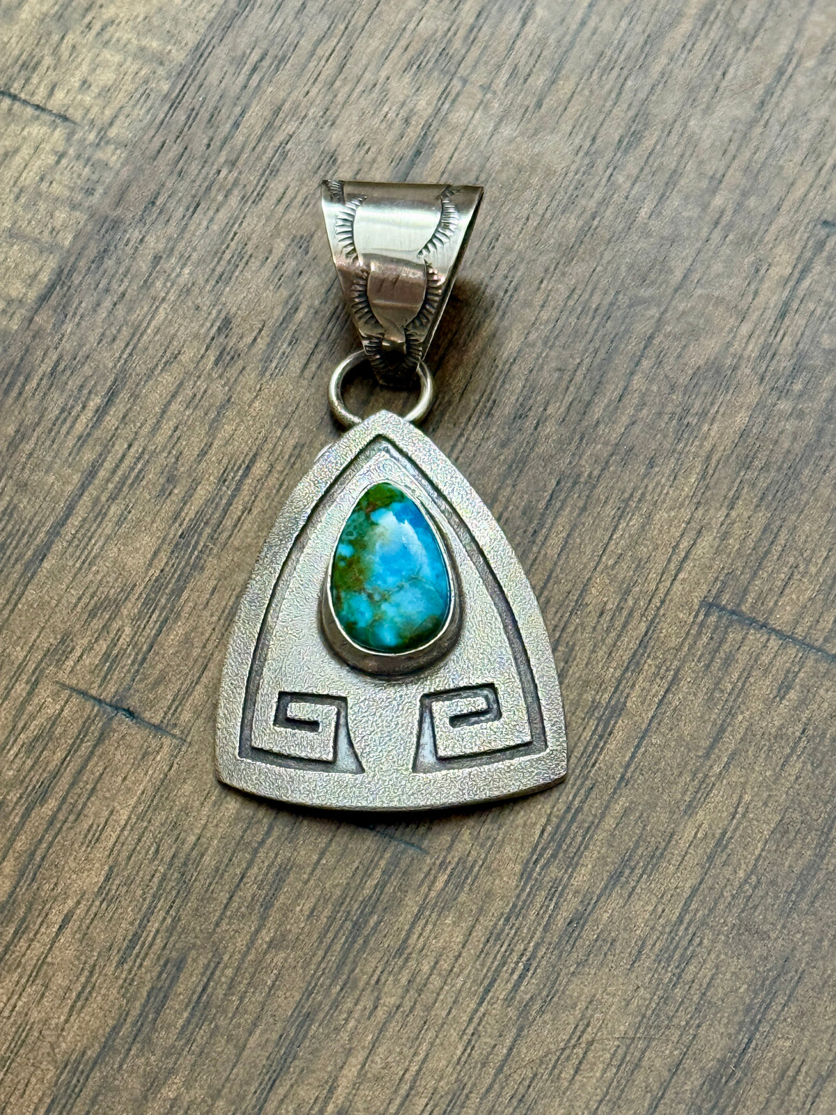 Mary and Everette Teller Water Wave Pattern with Sonoran Gold Pendant