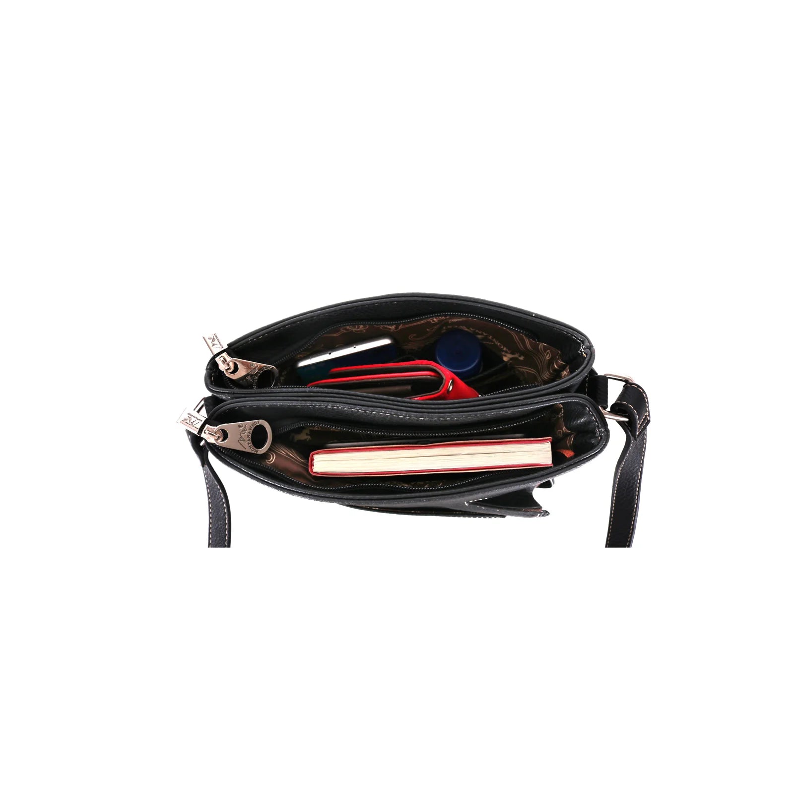 Black handbag with items inside on a white background