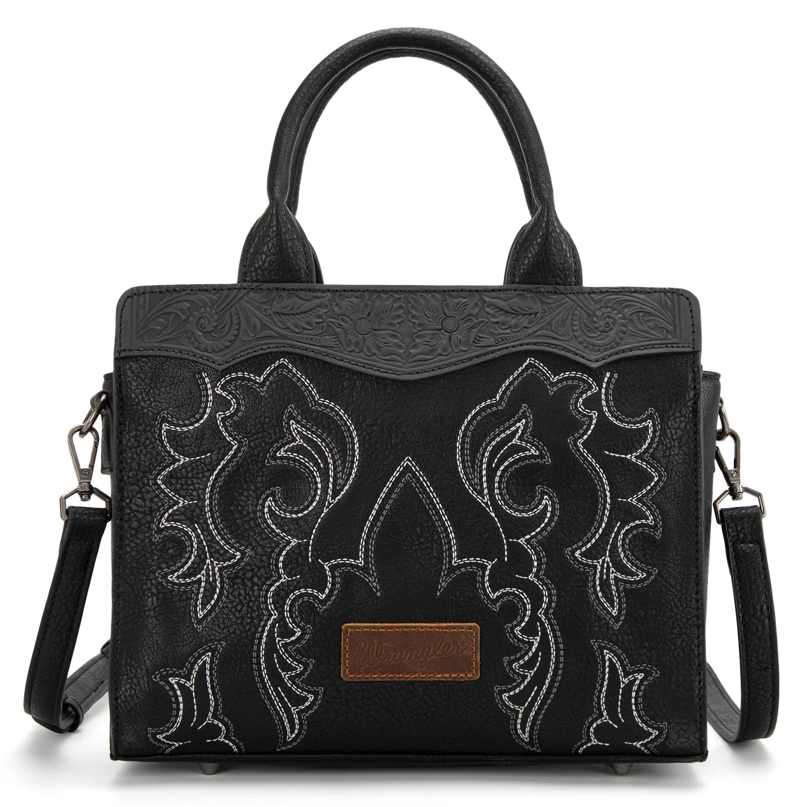Black handbag with intricate white embroidery on a white background