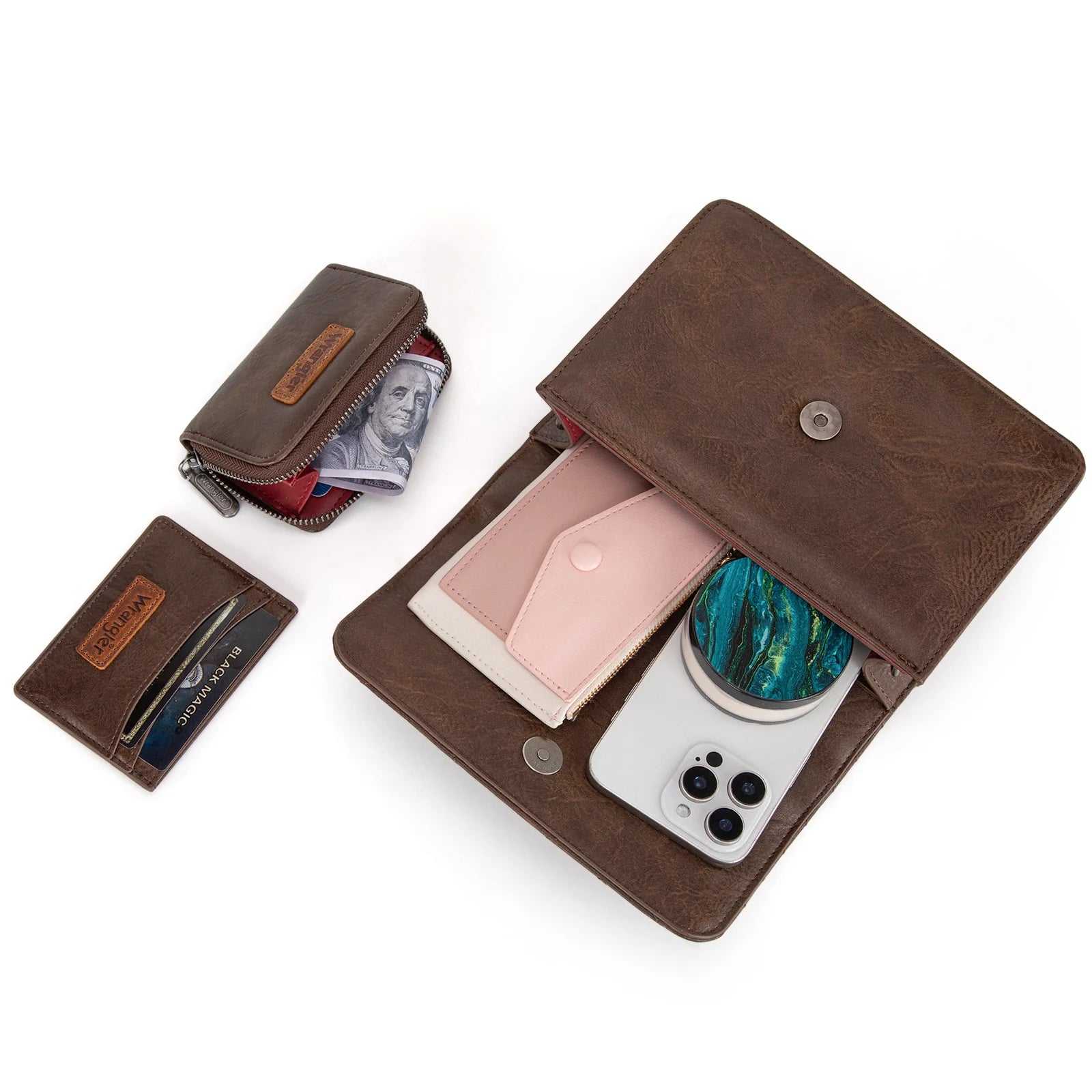 A brown Wrangler 3-piece crossbody set including a mini top handle bag, a wallet, and a card case, each featuring the iconic Wrangler logo.