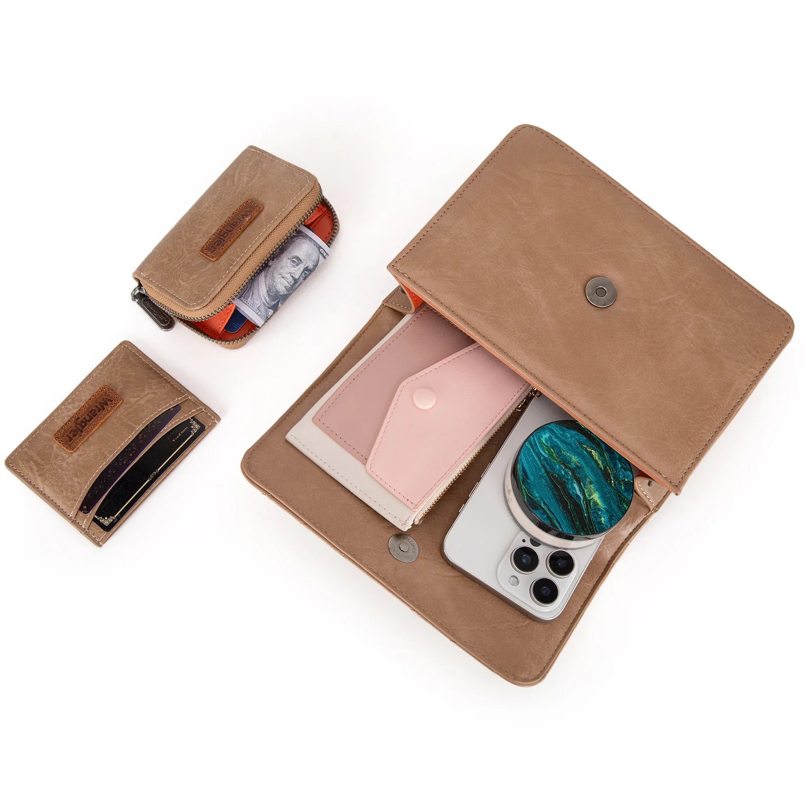 A set of three brown Wrangler branded leather goods, including a crossbody bag, a coin wallet, and a card case.