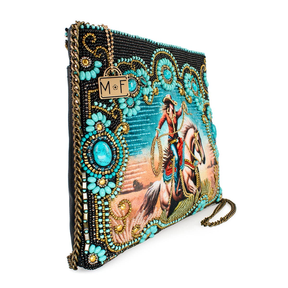 Decorative clutch bag with a cowboy design and turquoise embellishments on a white background